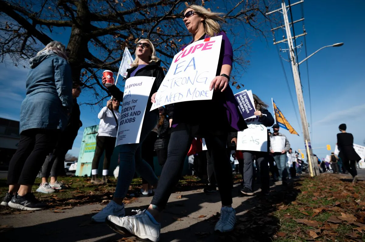 CUPE members and supporters join a demonstration near Member of Provincial Parliament of Ontario Lisa MacLeod’s office in Ottawa on Nov. 4, 2022. (Spencer Colby/The Canadian Press)
