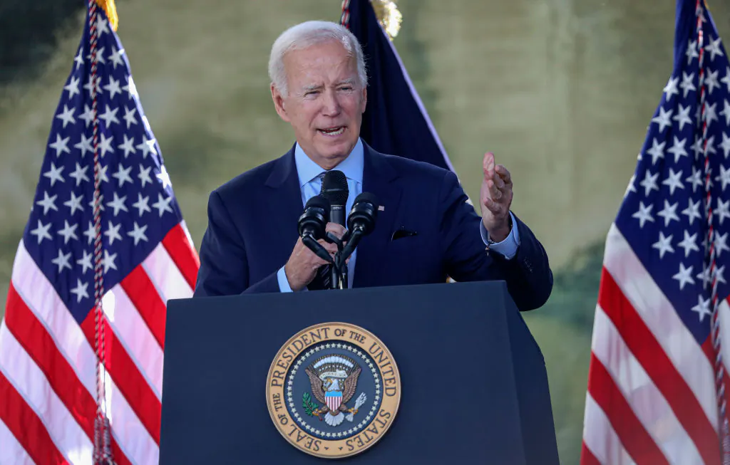 President Joe Biden speaks with dignitaries and employees at ViaSat in Carlsbad, Calif., on Nov. 2, 2022. (Sandy Huffaker/Getty Images)
