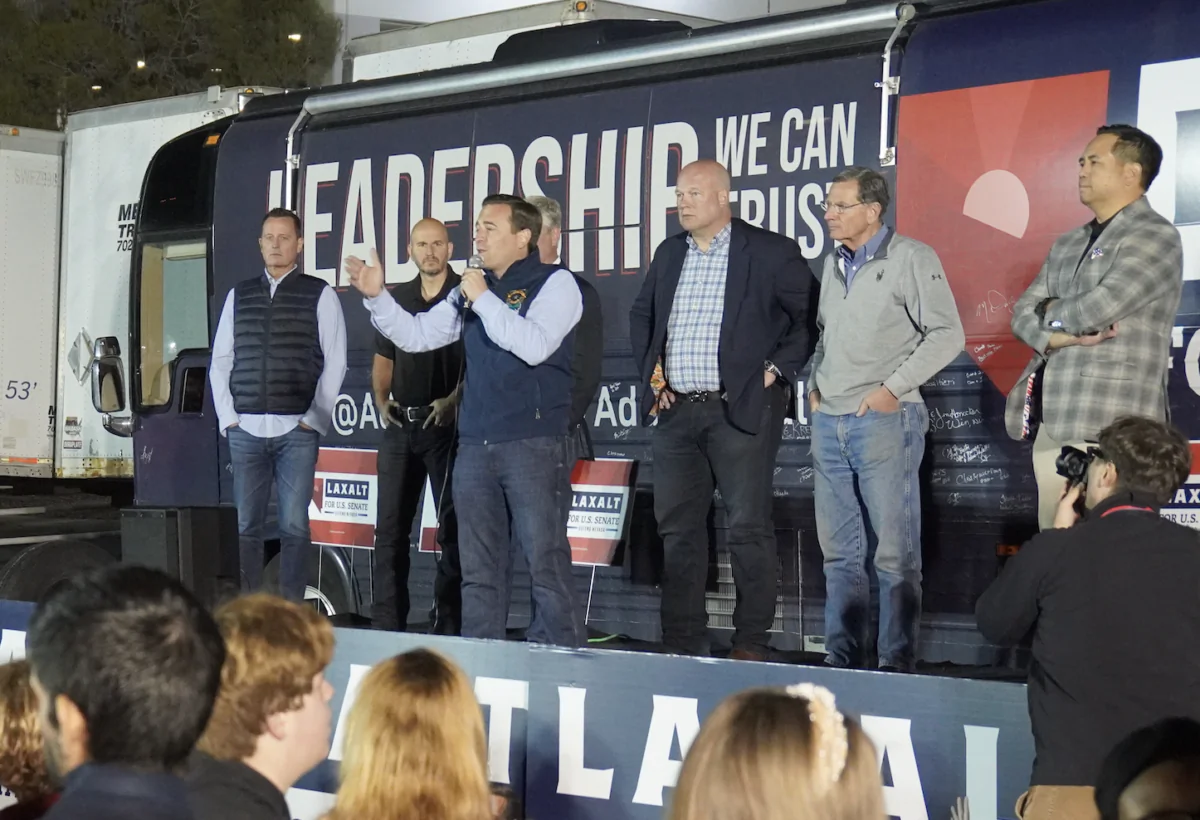 Nevada Republican Senate candidate Adam Laxalt addresses about 200 supporters at Nov. 4 North Las Vegas rally that included endorsements from (left-to-right), former National Intelligence Director Adviser Ric Grennell, National Border Patrol Council President Brandon Judd, former National Security Advisor Richard O’Brien, former acting U.S. Attorney General Matt Whitaker, Sen. John Barasso (R-Wyo.), and Utah Attorney General Sean Reyes. (Epoch Times/John Haughey)