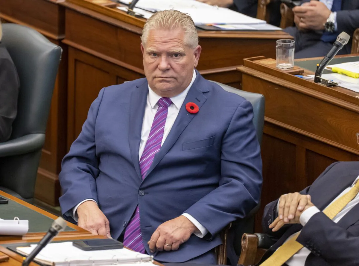 Ontario Premier Doug Ford sits in the Ontario Legislature as members debate a bill meant to avert a planned strike by 55,000 education workers, on Nov. 1, 2022. (The Canadian Press/Frank Gunn)