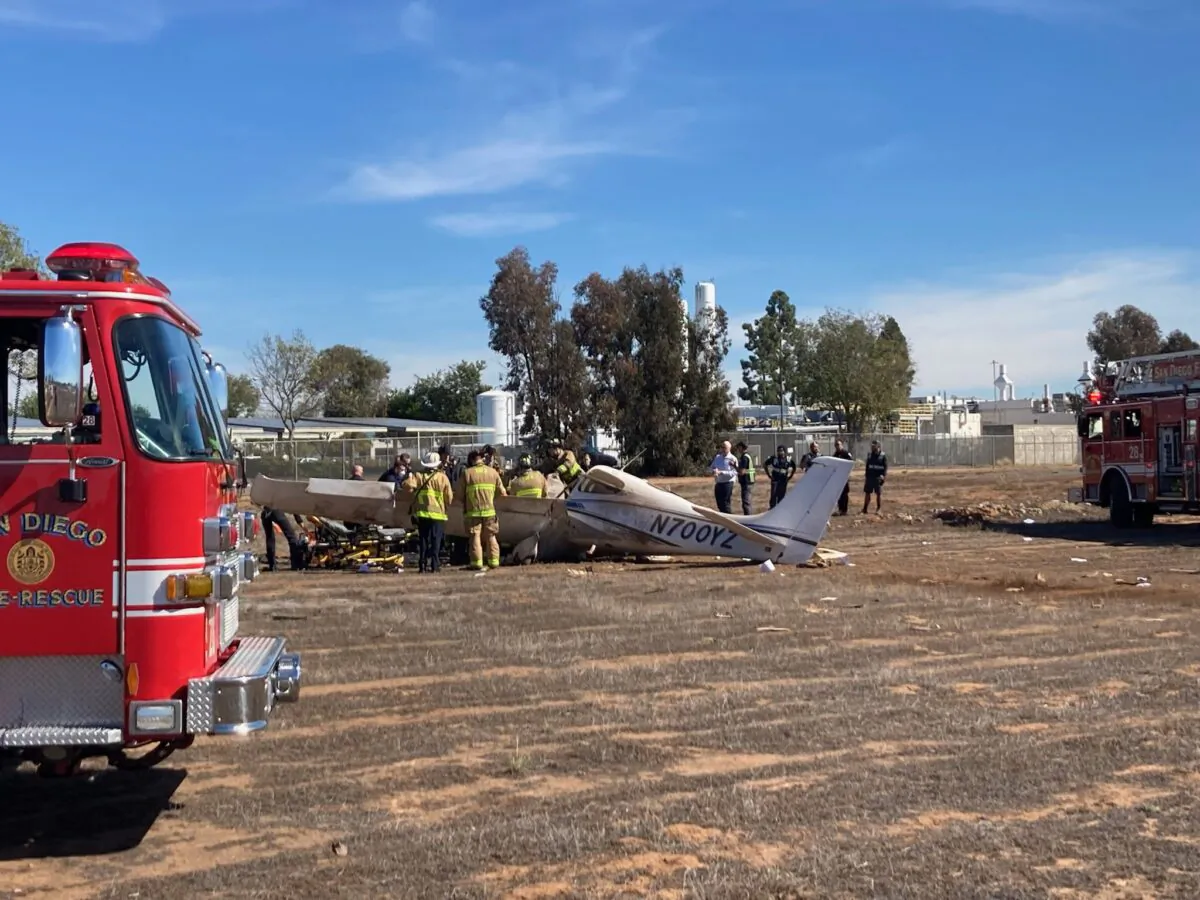 San Diego Fire Department crews at scene of a small plane crash on the northwest end of Montgomery Field. (Courtesy of San Diego Fire Department)