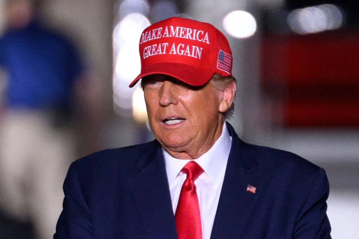 Former President Donald Trump arrives for a "Save America" rally ahead of the midterm elections at Arnold Palmer Regional Airport in Latrobe, Pa., on Nov. 5, 2022. (Angela Weiss/AFP via Getty Images)