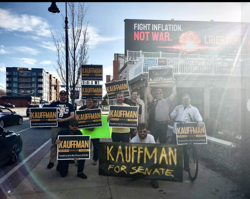 Supporters of New Hampshire Libertarian candidate Jeremy Kauffman who is running against Republican Don Bolduc and Democrat Maggie Hassan
