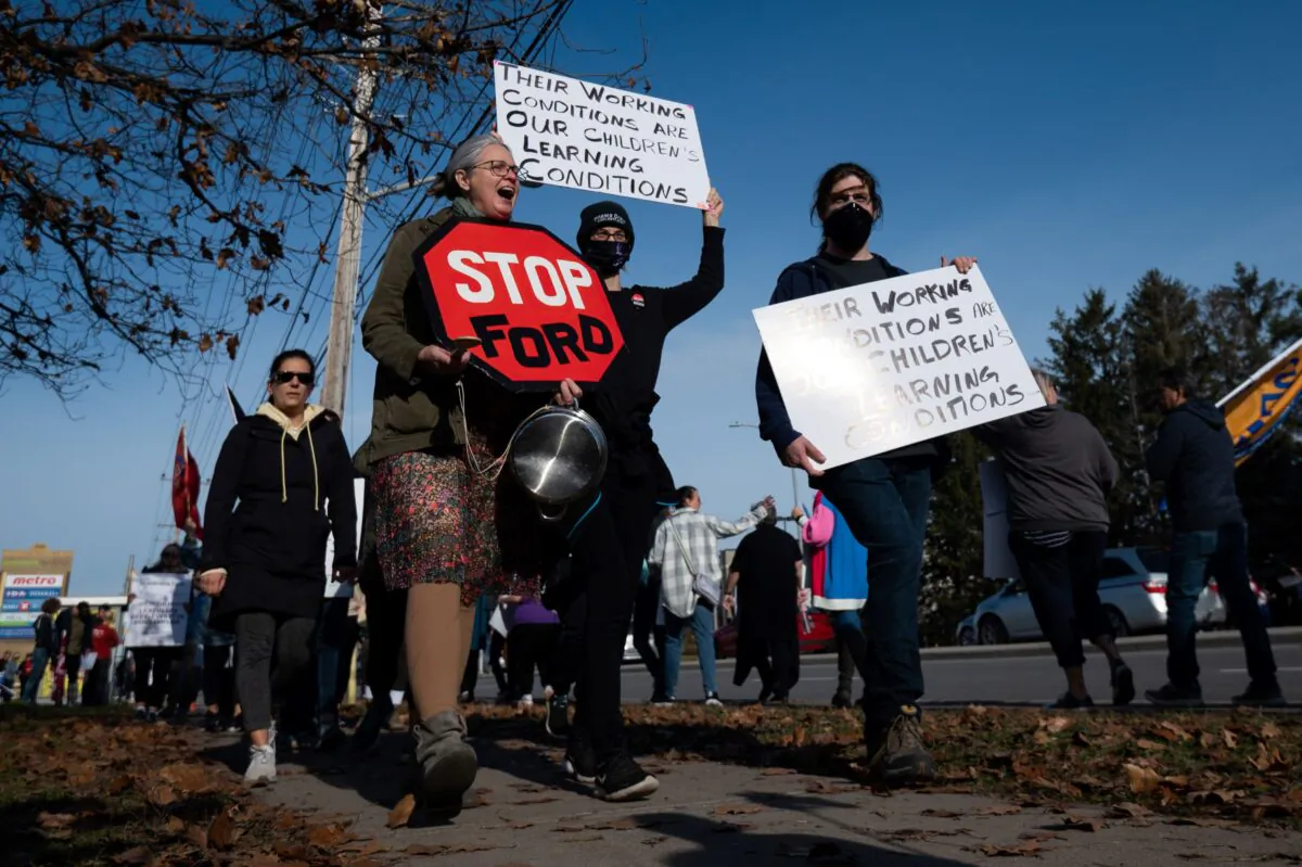 CUPE members and supporters join a demonstration in Ottawa on Nov. 4, 2022. (The Canadian Press/Spencer Colby)
