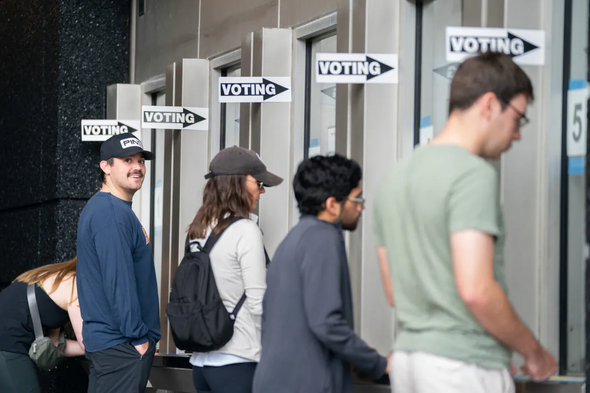 People check in for early voting at a polling location at Bank of America Stadium in Charlotte, N.C., on Nov. 5, 2022. (Sean Rayford/Getty Images)