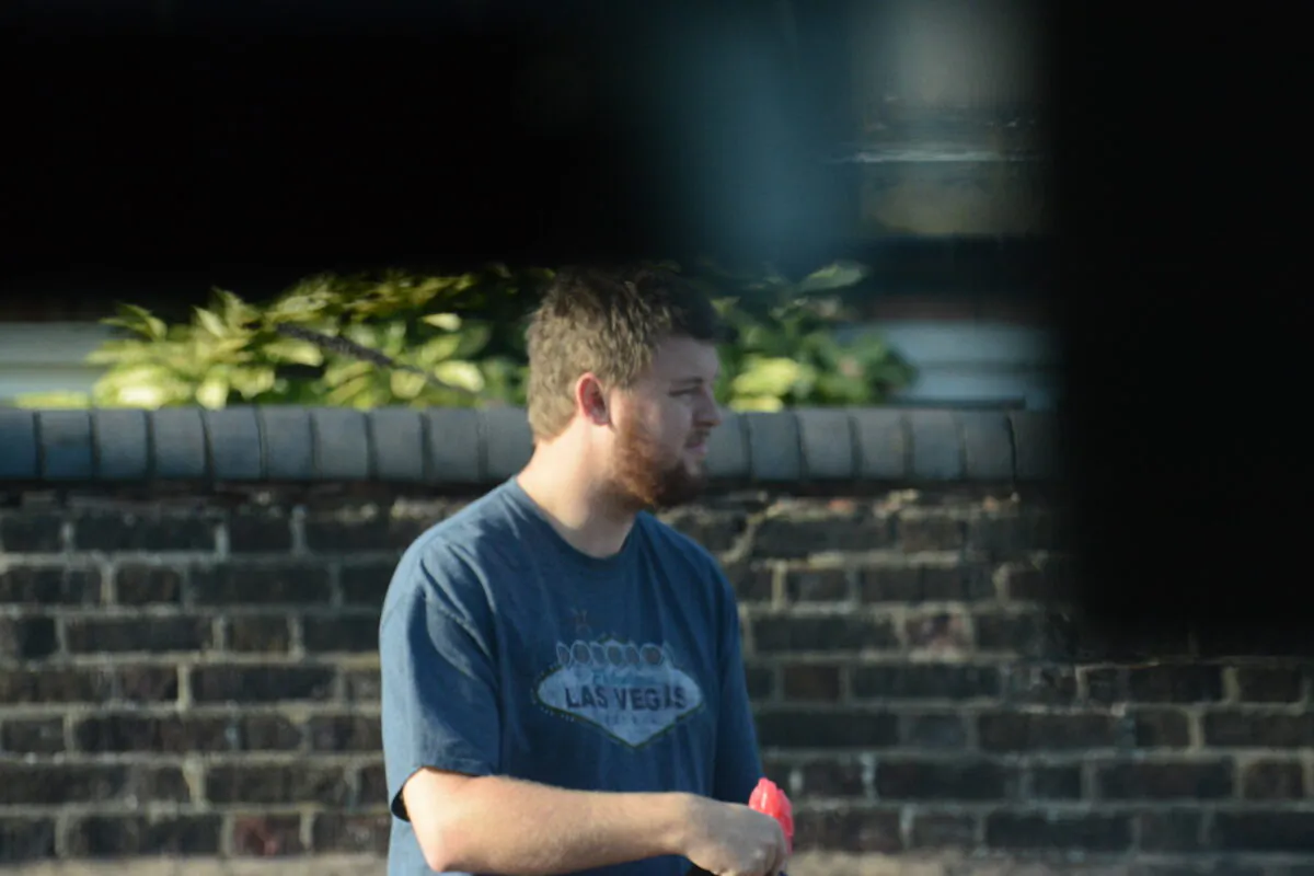 An undated image, taken by a police surveillance team, of Jordan Croft, a prolific online paedophile from Worthing, West Sussex, who was jailed on Nov. 10, 2022. (National Crime Agency)