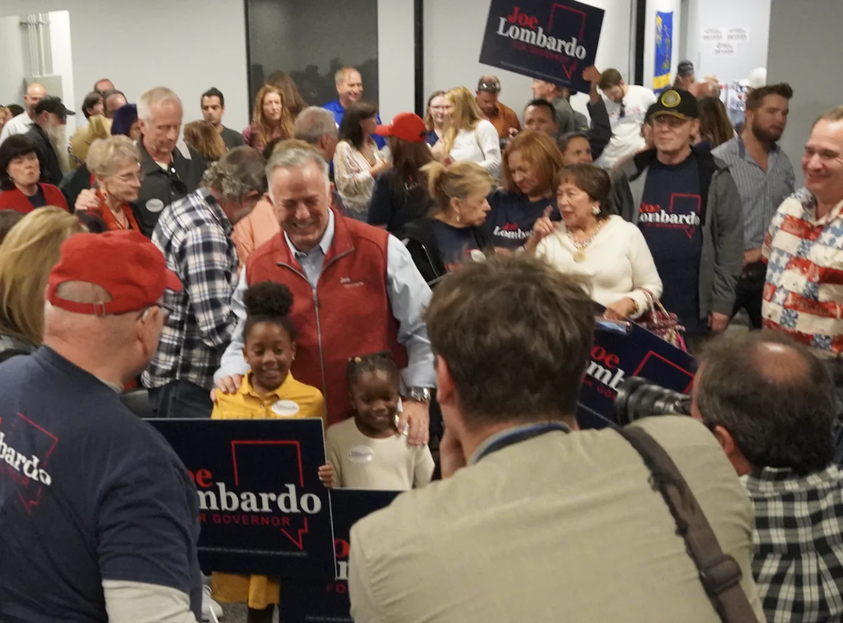 Clark County Sheriff and GOP gubernatorial candidate Joe Lombardo is surrounded by supporters during a rally at the Nevada Republican Party’s office in Henderson, Nev., on Nov. 6, 2022. (John Haughey/The Epoch Times)
