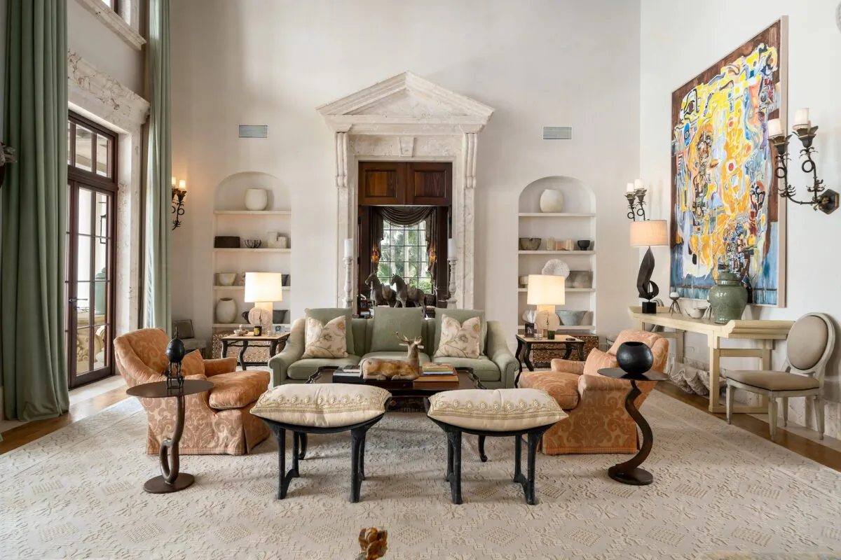 The common areas were skillfully designed to complement the home’s Colonial-style architecture, with period-correct tall ceilings. (Courtesy of Damianos Sotheby’s International Realty)