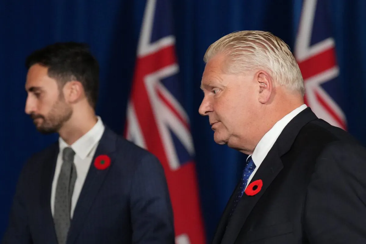 Ontario Premier Doug and Energy Minister Stephen Lecce leave after a press conference at Queen's Park in Toronto on Nov. 7, 2022. (The Canadian Press/Nathan Denette)
