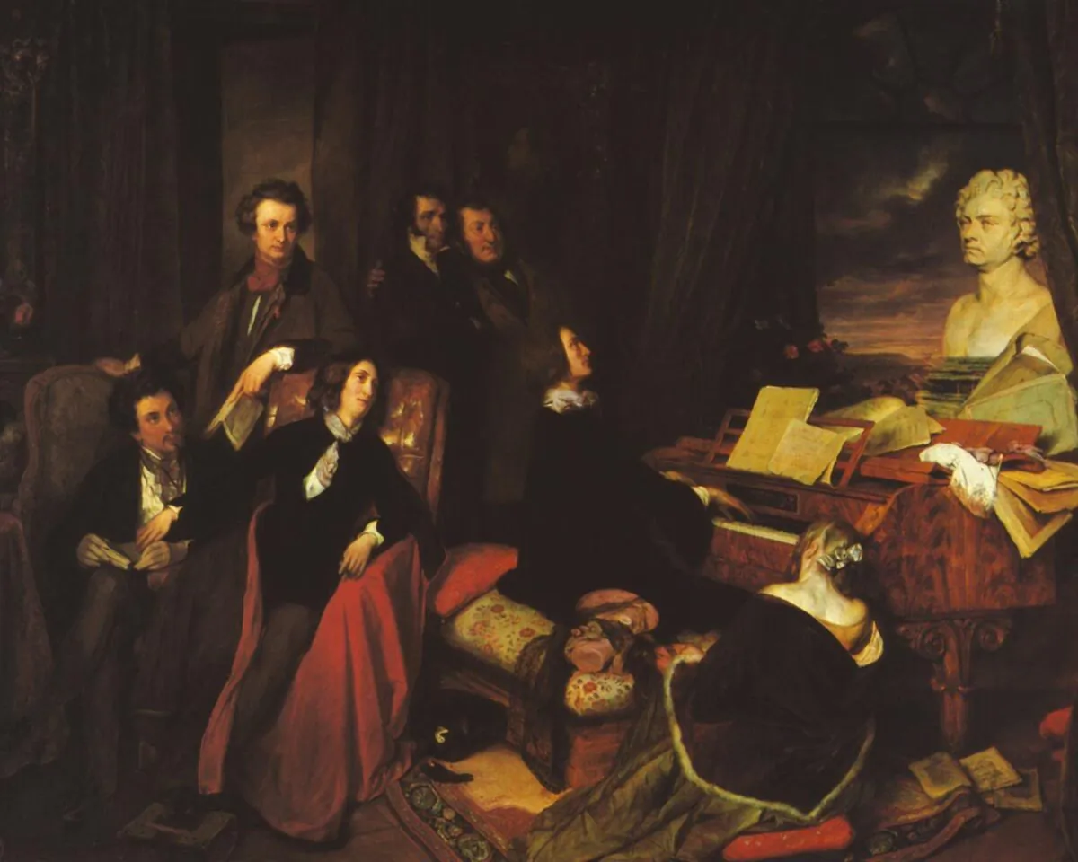 “Franz Liszt Fantasizing at the Piano,” 1840, by Josef Danhauser. The painting shows an imagined gathering of celebrities of the day, with Franz Liszt is seated at the keyboard, Paganini standing in the center background, and all gathered regarding a bust of Beethoven. State Museum of Berlin. (Public Domain)