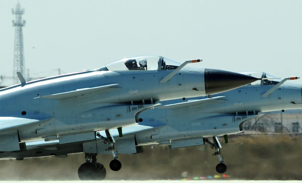 Chinese fighter jets take off at the Yangcun Air Force base of the People's Liberation Army Air Force in Tianjin, southeast of Beijing, in a file photo. (Frederic J. Brown/AFP via Getty Images)