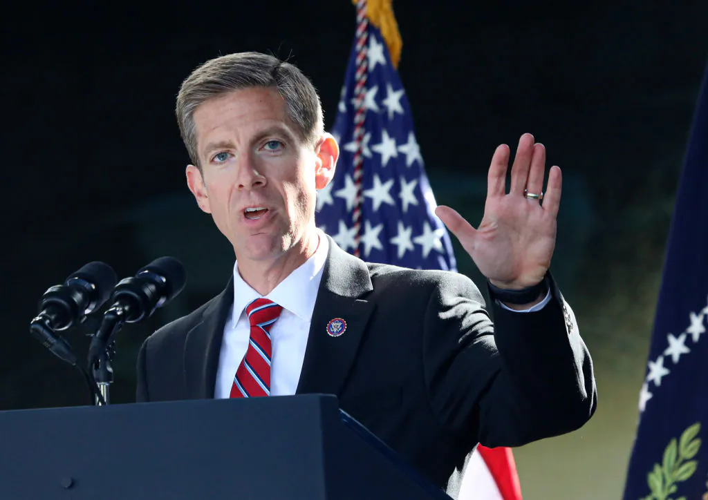 Democratic congressional candidate Mike Levin (D-Calif.) speaks with dignitaries and employees at ViaSat in Carlsbad, Calif., on Nov. 4, 2022. (Sandy Huffaker/Getty Images)