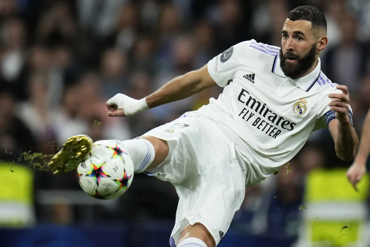 Real Madrid's Karim Benzema kicks the ball during the Champions League Group F soccer match between Real Madrid and Celtic at the Santiago Bernabeu stadium in Madrid on Nov. 2, 2022. (Manu Fernandez/AP Photo)