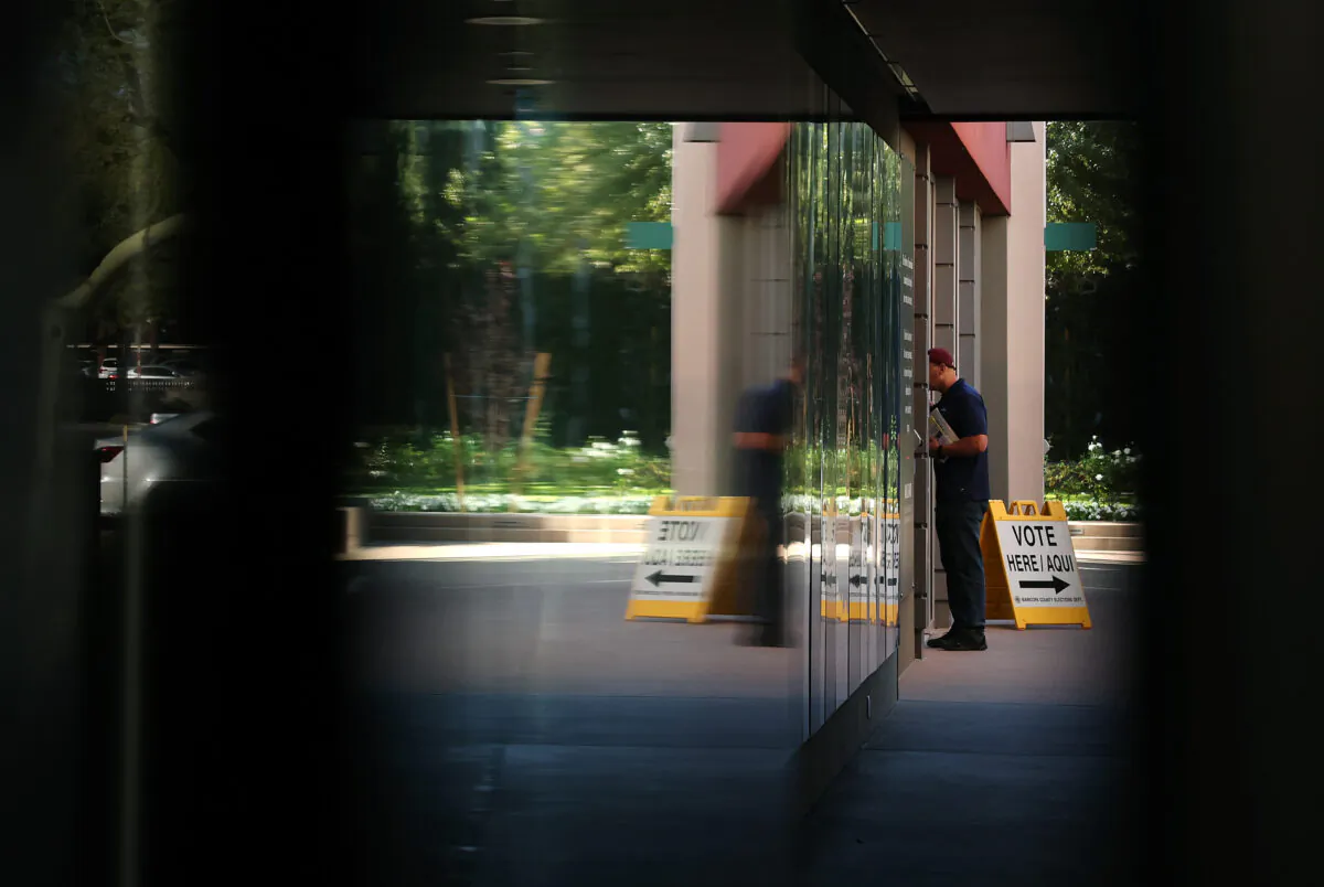 A voter leaves after casting their ballot at the Phoenix Art Museum on Nov. 8, 2022. (Kevin Dietsch/Getty Images)