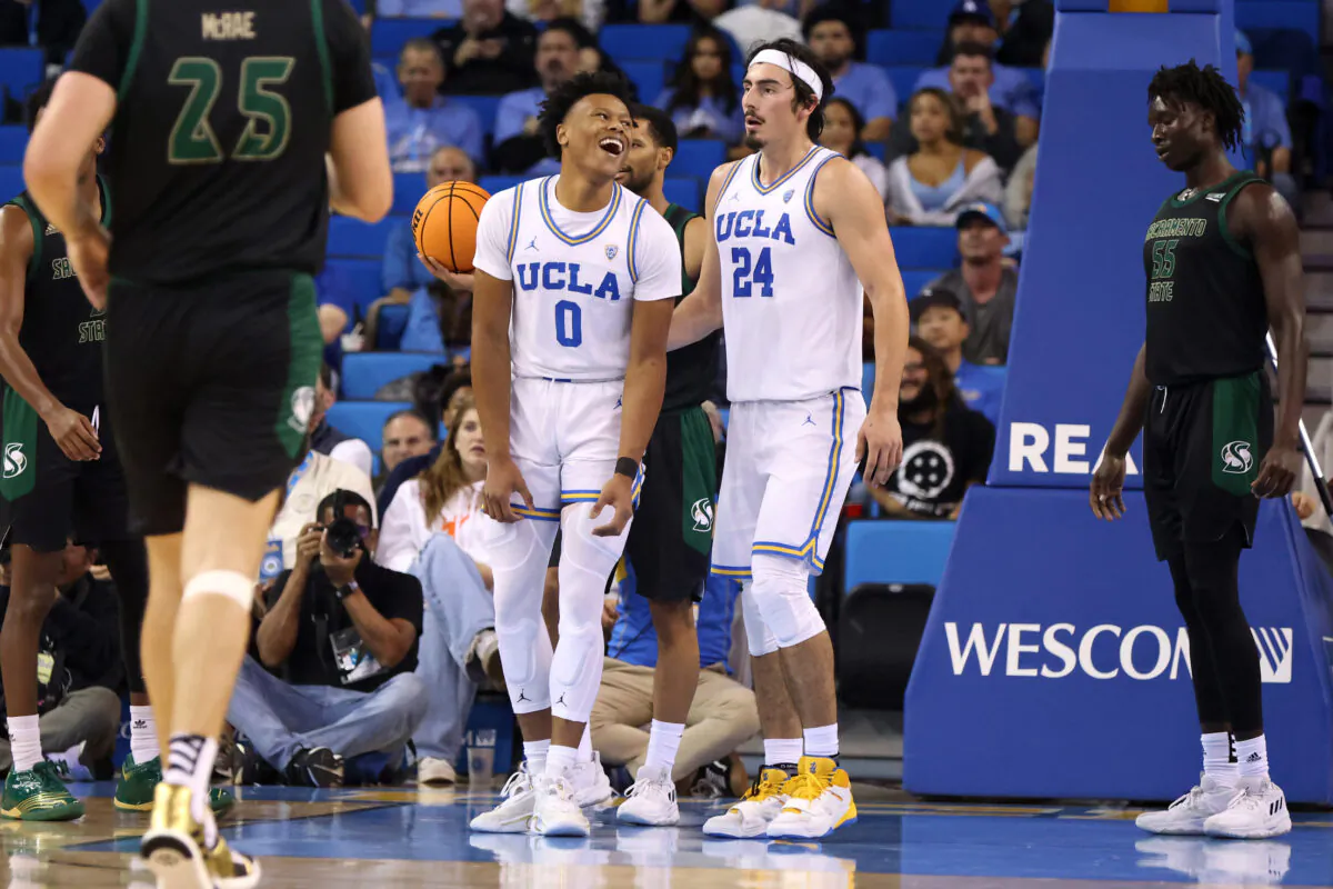Jaylen Clark (0)  and Jaime Jaquez Jr. (24) of the UCLA Bruins react during the second half of a game against the Sacramento State Hornets at at UCLA Pauley Pavilion in Los Angeles, on Nov. 7, 2022. (Katharine Lotze/Getty Images)