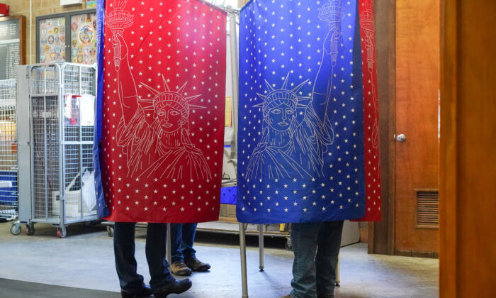 Residents cast votes at Neversink fire engine company in Port Jervis, N.Y., on Nov. 8, 2022. (Cara Ding/The Epoch Times)
