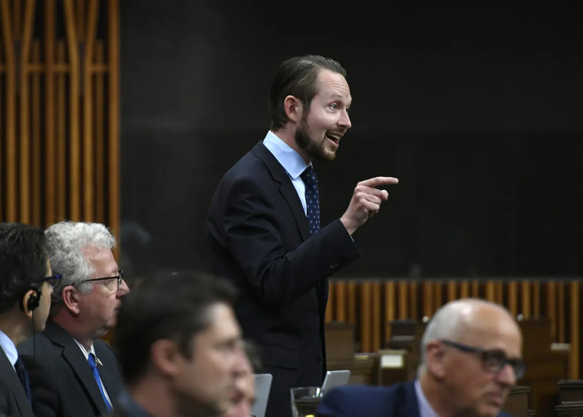 Conservative MP Michael Cooper rises during question period in the House of Commons on Parliament Hill in Ottawa on June 10, 2022. (Justin Tang/The Canadian Press)
