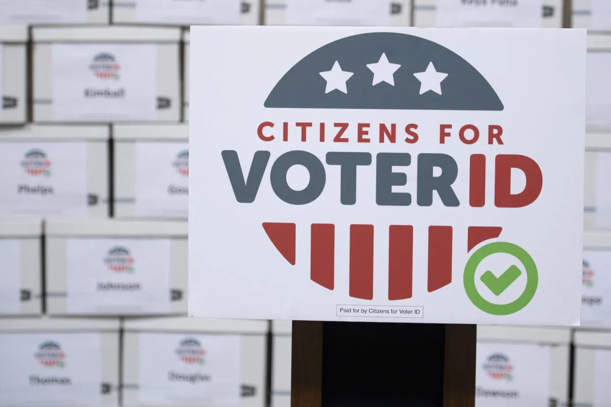 Boxes of signatures are displayed after a news conference hosted by Citizens for Voter ID at the Nebraska Capitol building in Lincoln, Nebraska, on July 7, 2022. (Noah Riffe/Lincoln Journal Star via AP)
