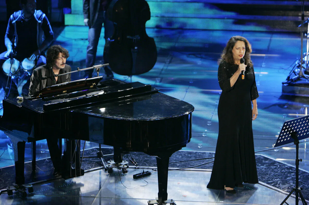 Sergio Cammariere sings "L'amore non si spiega" with Brazilian singer Gal Costa during the "Festival di Sanremo" Italian song contest, in San Remo, Italy, on Feb. 28, 2008. (Antonio Calanni/AP Photo)