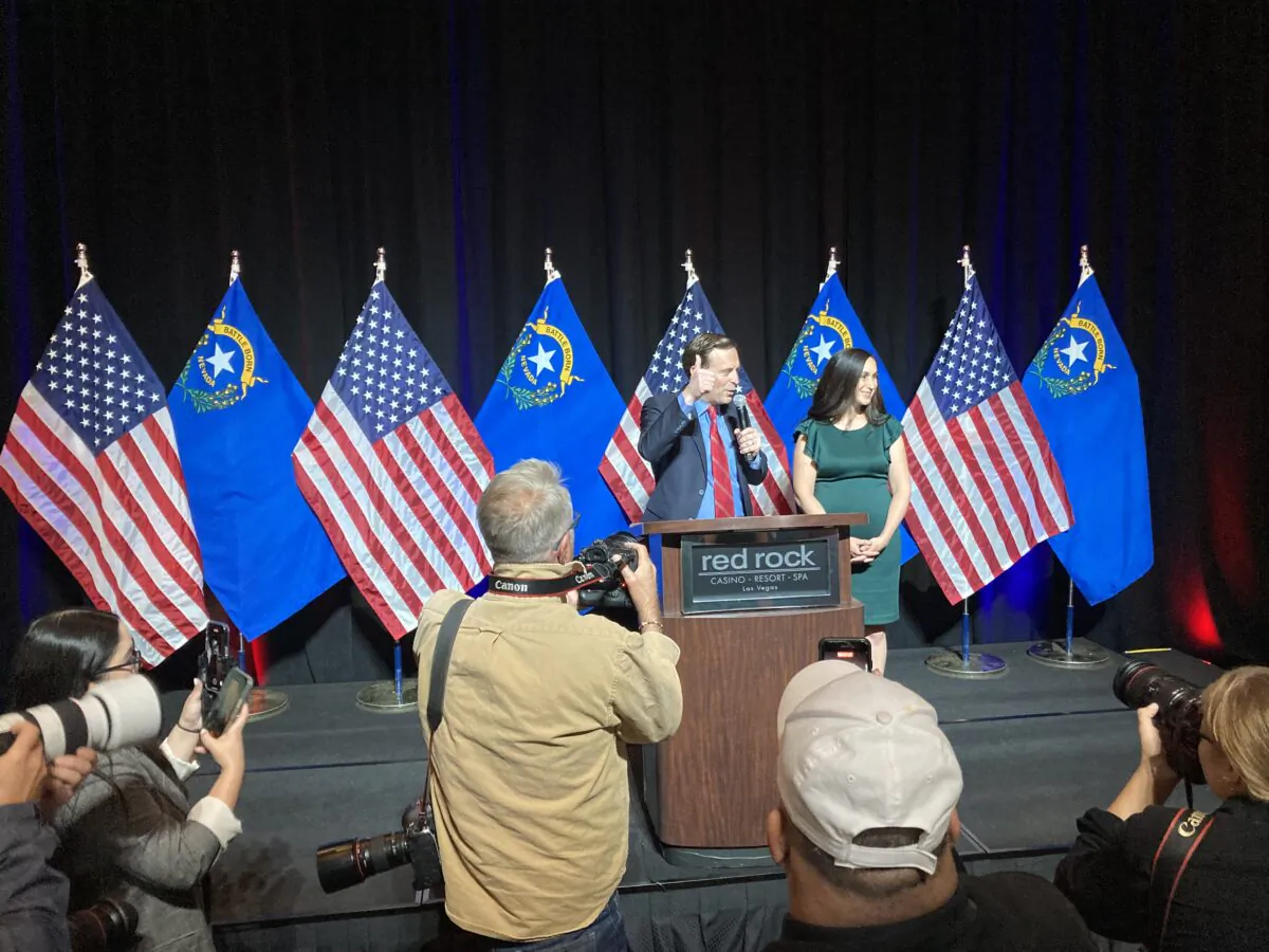 Nevada Republican Senate candidate Adam Laxalt and his wife, Jamie, thank supporters at the Red Rocks Casino in Summerlin, Nev., on Nov. 8, 2022. (John Haughey/The
Epoch Times)
