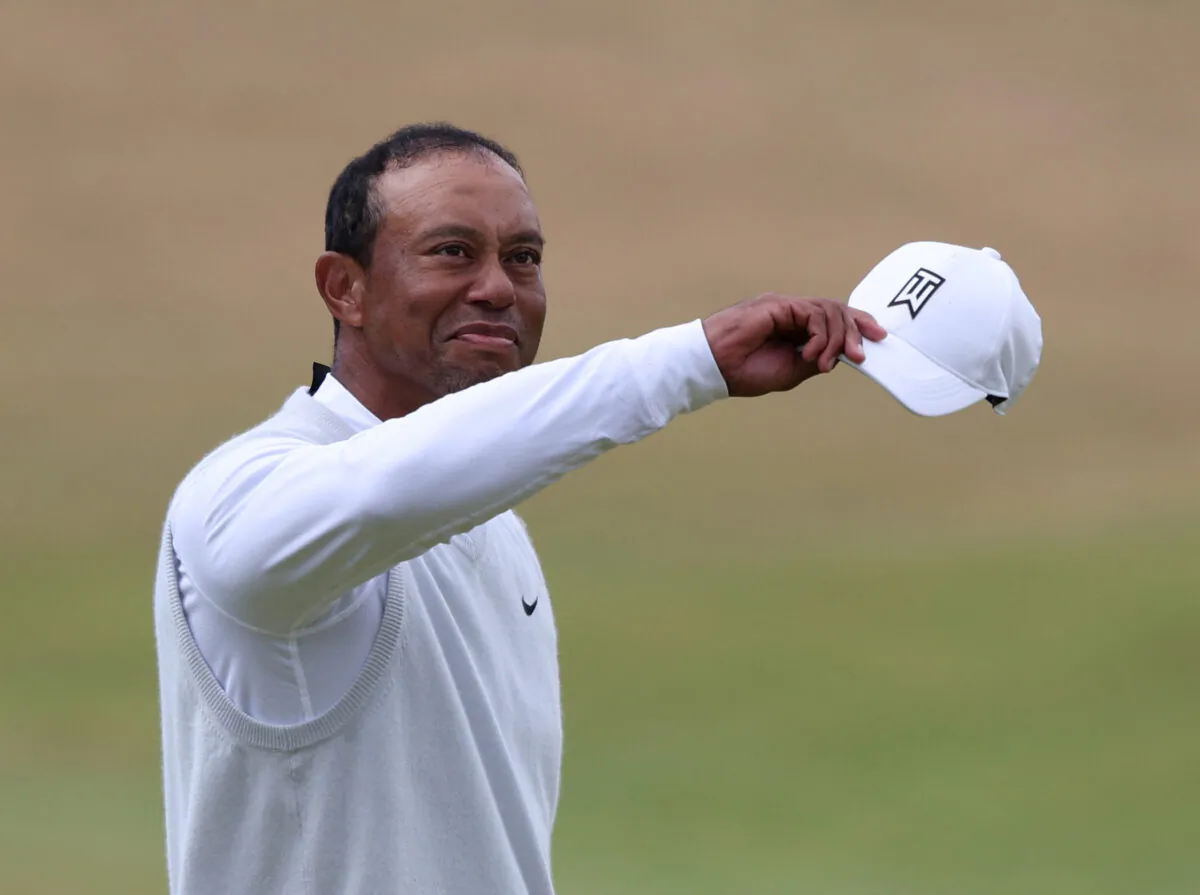 Tiger Woods acknowledges spectators after finishing his second round of The 150th Open Championship in St Andrews, Scotland, Britain, on July 15, 2022. (Russell Cheyne/Reuters)