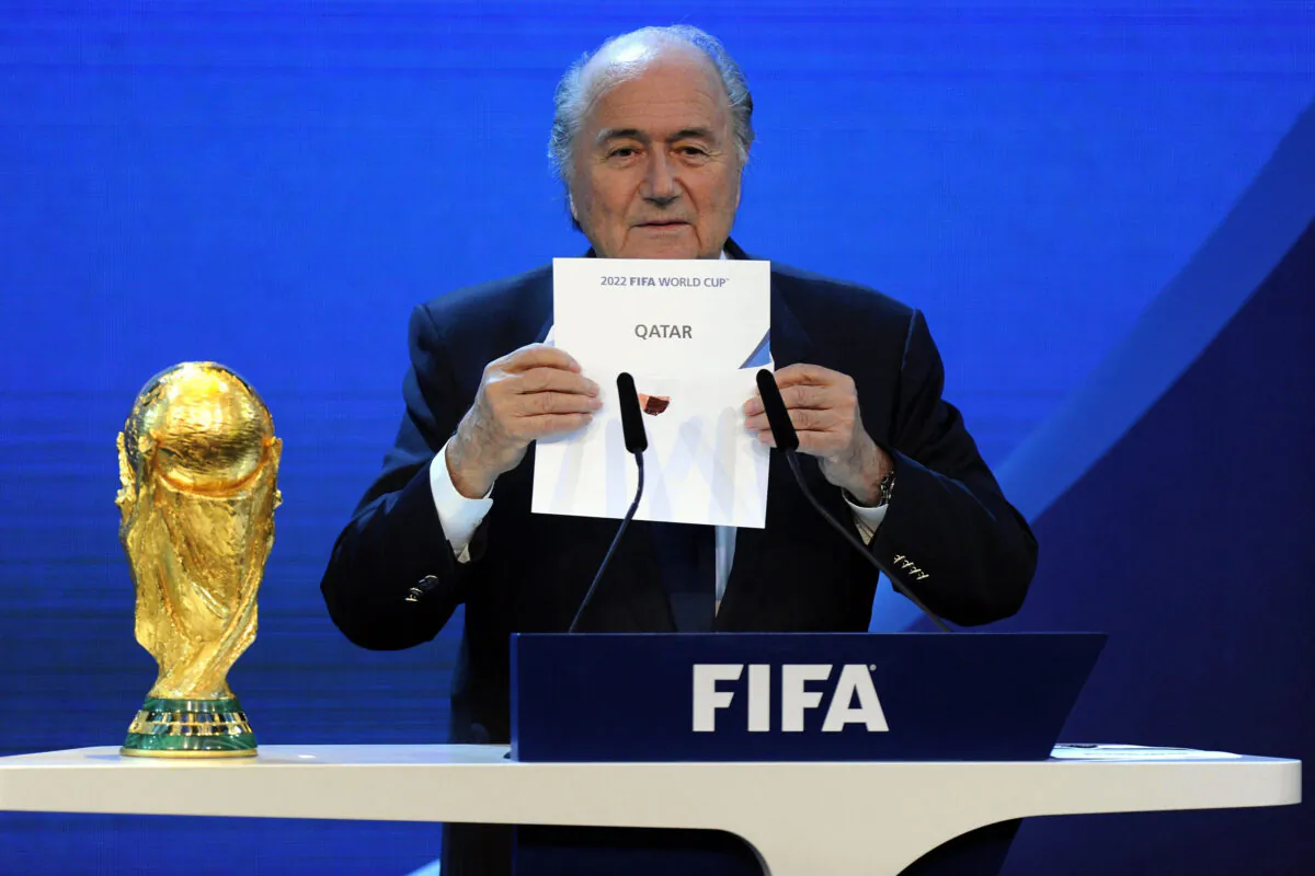 Former FIFA president Sepp Blatter Joseph S. Blatter announces that Qatar will be hosting the 2022 World Cup during the FIFA 2018 and 2022 World Cup Bid Announcement in Zurich, Switzerland., on Dec. 2, 2010. (Keystone/Walter Bieri/AP Photo)