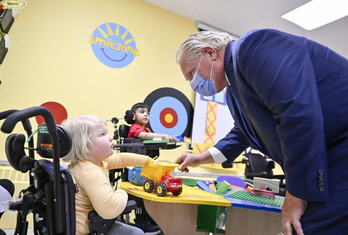 Ontario Premier Doug Ford meets students at the CHEO School as he arrives for a photo opportunity at the Children's Hospital of Eastern Ontario in Ottawa on Oct. 17, 2022. (The Canadian Press/Justin Tang)
