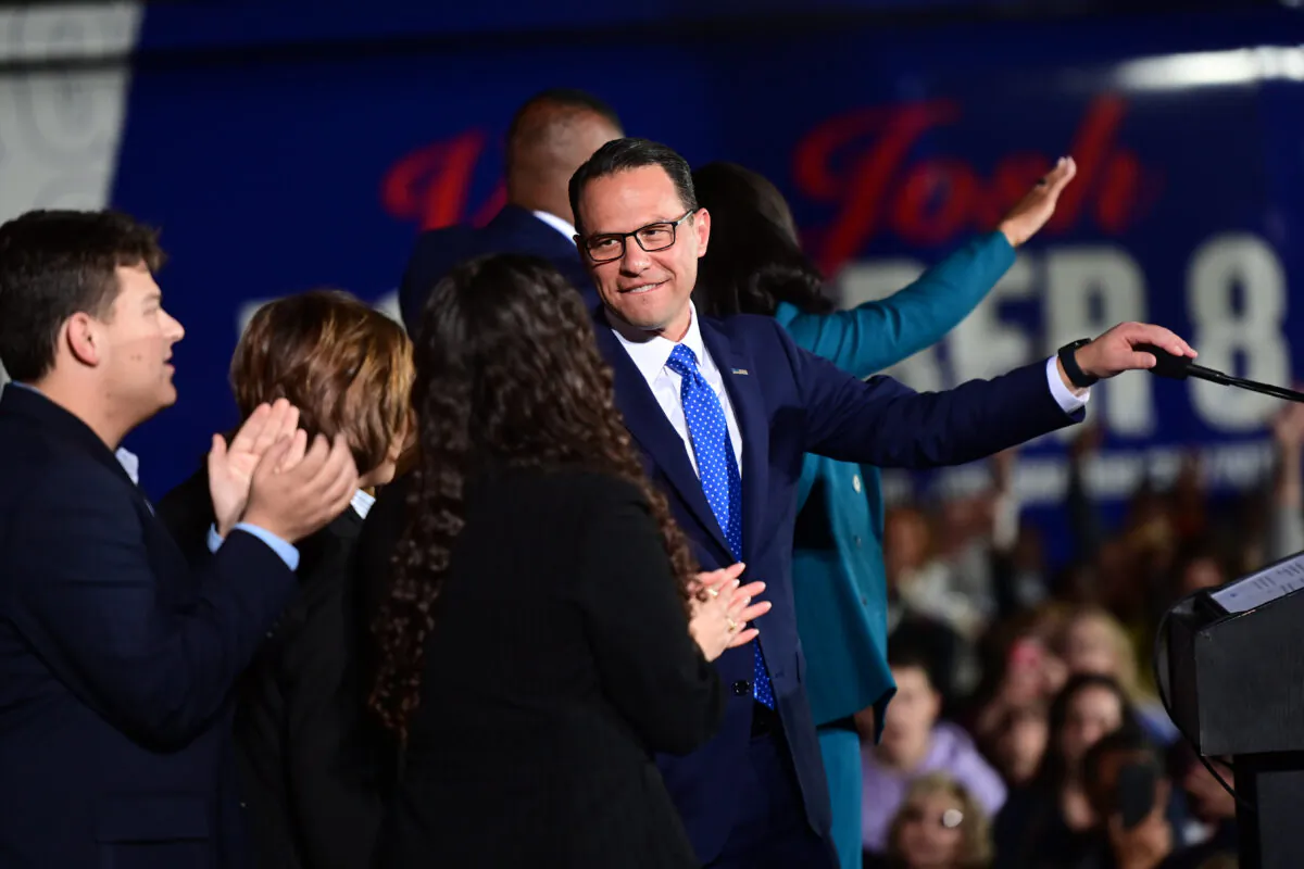 Democratic gubernatorial nominee Josh Shapiro greets his family after giving a victory speech to supporters at the Greater Philadelphia Expo Center in Oaks, Pa., on Nov. 8, 2022. (Mark Makela/Getty Images)