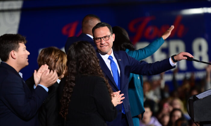 Democratic gubernatorial nominee Josh Shapiro greets his family after giving a victory speech to supporters at the Greater Philadelphia Expo Center in Oaks, Pa., on Nov. 8, 2022. (Mark Makela/Getty Images)