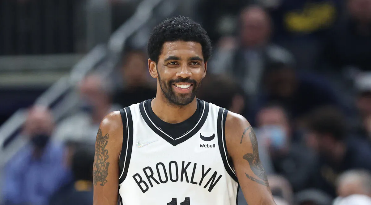 Kyrie Irving (11) of the Brooklyn Nets dribbles the ball during the game against the Indiana Pacers at Gainbridge Fieldhouse in Indianapolis, on Jan. 5, 2022. (Andy Lyons/Getty Images)