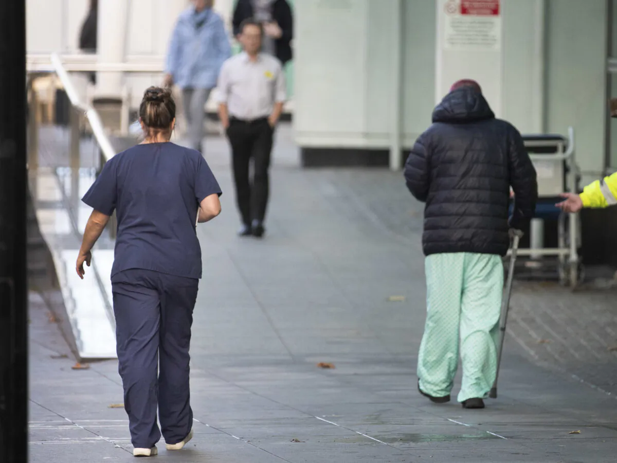 Hospital staff outside University College Hospital in London on Nov. 9, 2022. (Joshua Bratt/PA Media)