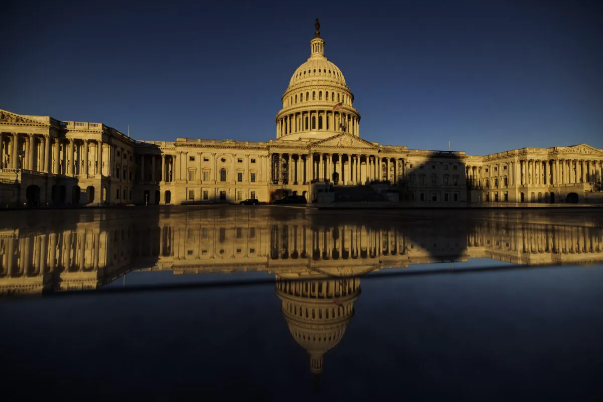 The rising sun illuminates the US Capitol building in Washington on Nov. 9, 2022. Control of the US Congress remains in balance after Democrats look to have held much of what was expected to be a Republican red wave at bay but some races still do not have a clear winner. (Samuel Corum/Getty Images)