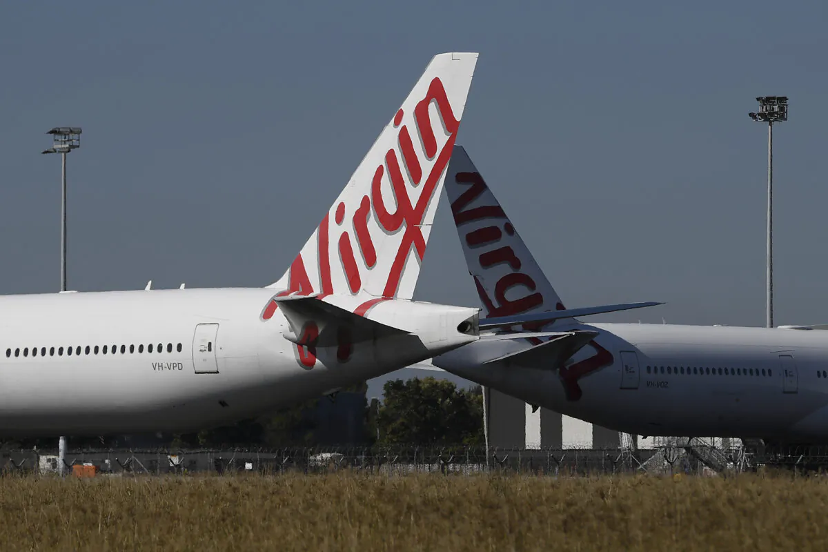 Virgin Australia wide-body aircrafts are seen parked in the Brisbane Airport in Brisbane, Australia, on Aug. 5, 2020. (Albert Perez/Getty Images)
