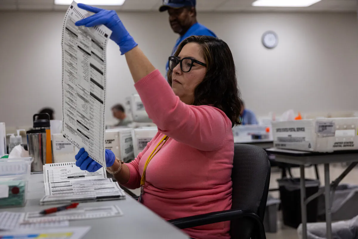 Election workers sort ballots at the Maricopa County Tabulation and Election Center in Phoenix on Nov. 9, 2022. (John Moore/Getty Images)
