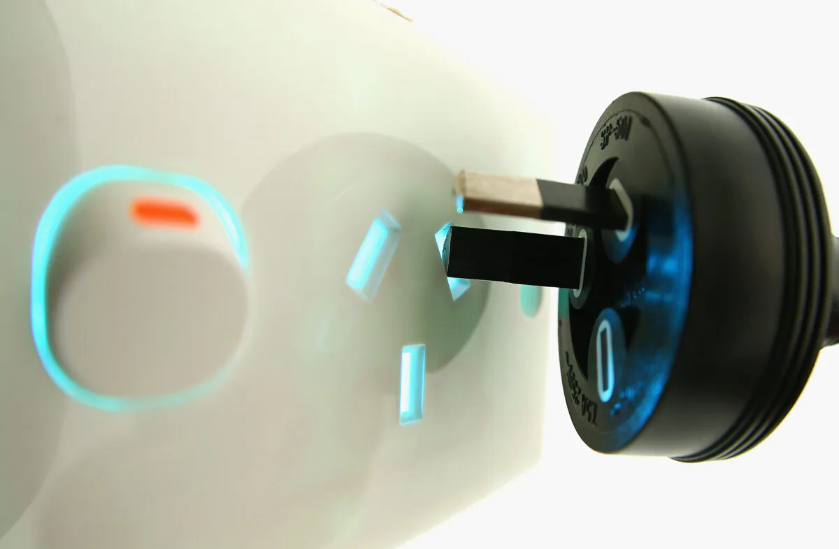 A power plug is placed into a power socket in Melbourne, Australia, on Oct. 22, 2012. (Quinn Rooney/Getty Images)