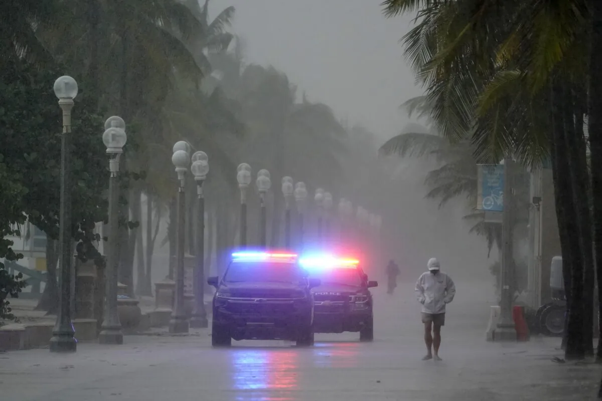 Police patrol the Hollywood Beach Broadwalk as conditions deteriorate with the approach of Hurricane Nicole in Hollywood Beach in Hollywood, Fla, on Nov. 9, 2022. (Wilfredo/Lee AP Photo)