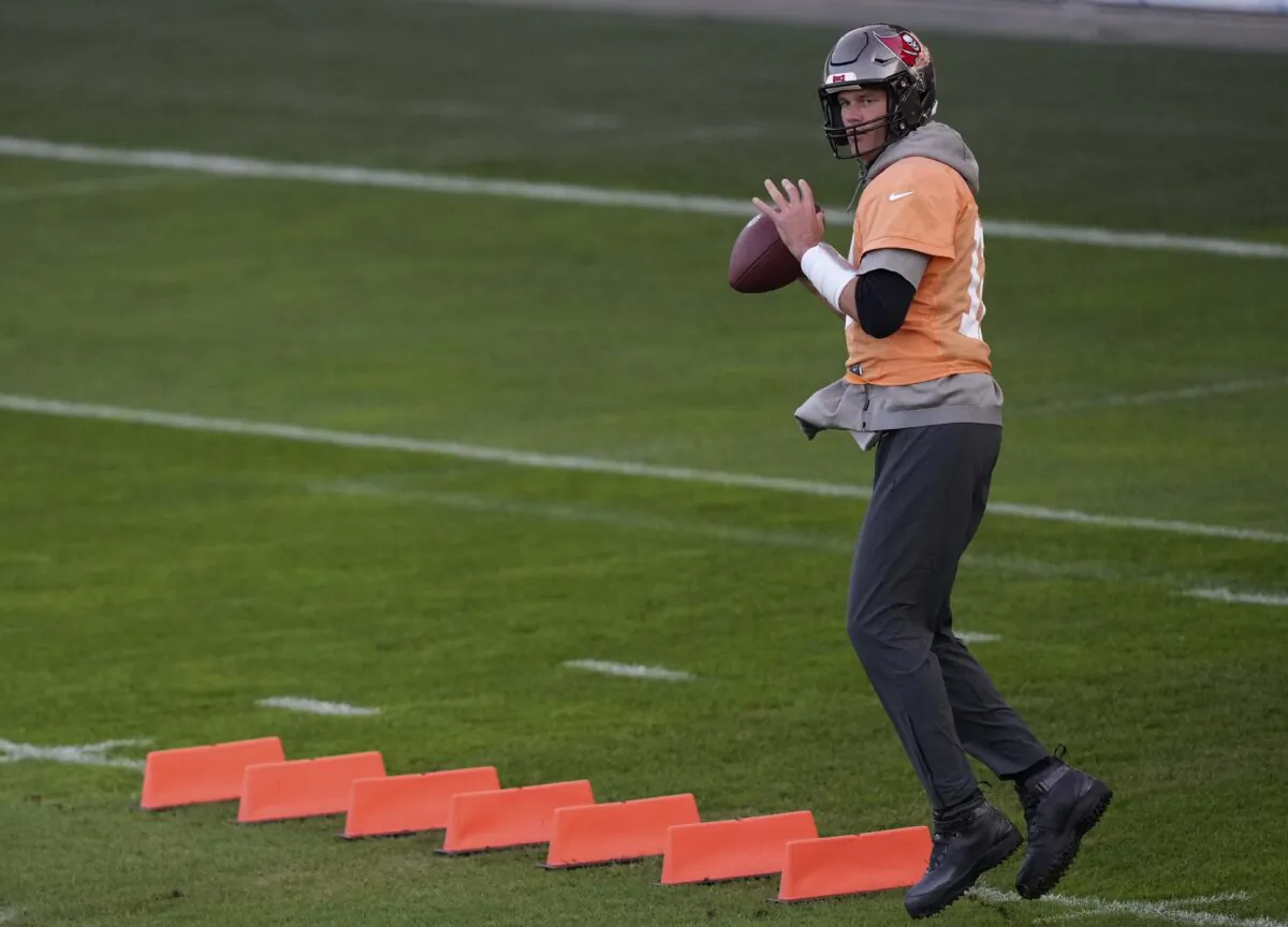 Tampa Bay Buccaneers quarterback Tom Brady throws a ball during a practice session in Munich on Nov. 11, 2022. (Matthias Schrader/AP Photo)