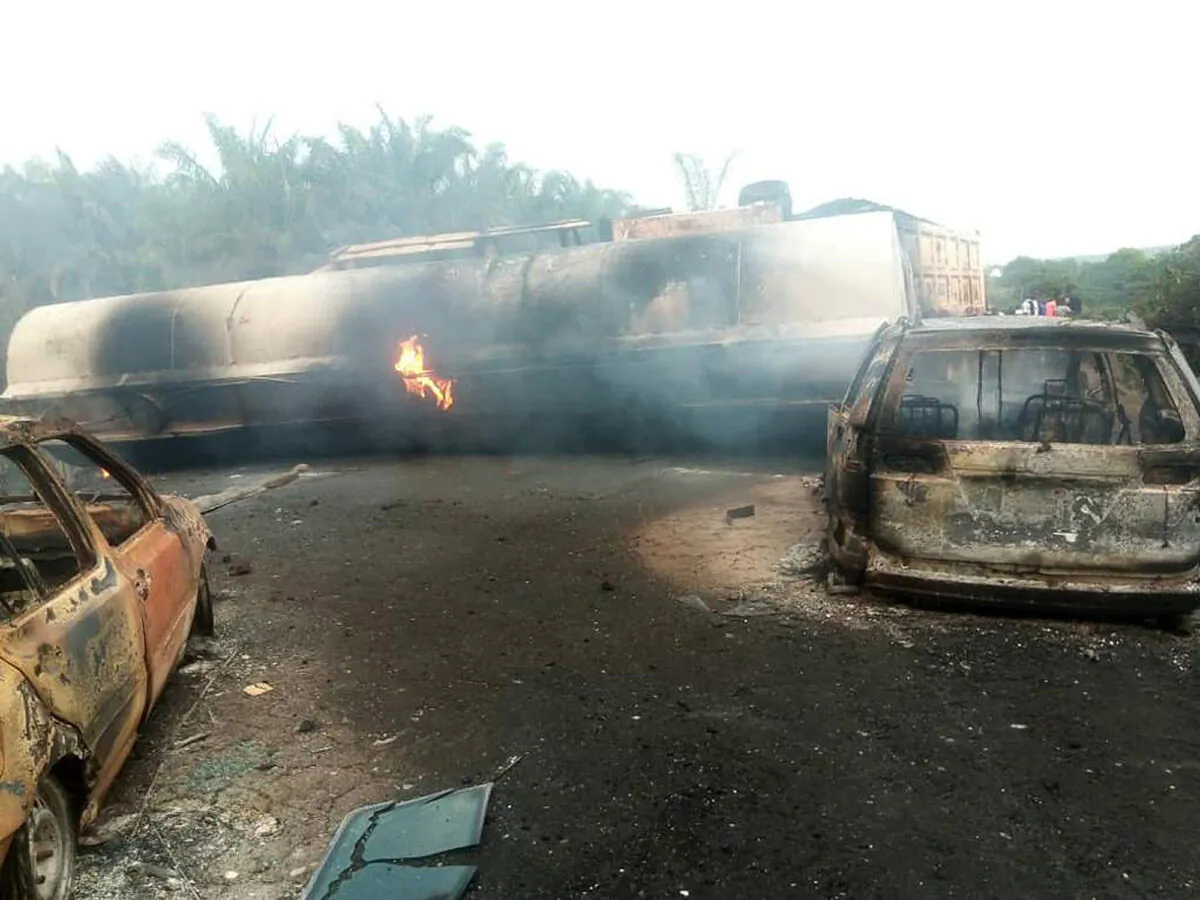 The scene of a gasoline tanker explosion on a highway in Kogi, Nigeria, on Nov. 10, 2022. (Odogun Samuel Olugbenga/AP Photo)