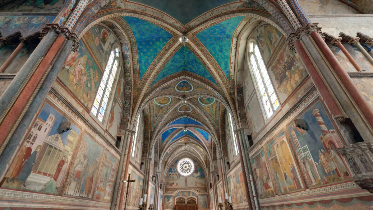 Assisi’s Basilica of St. Francis – colorfully frescoed by Giotto – inspires tourists and pilgrims today. (Dominic Arizona Bonuccelli, Rick Steves’ Europe)