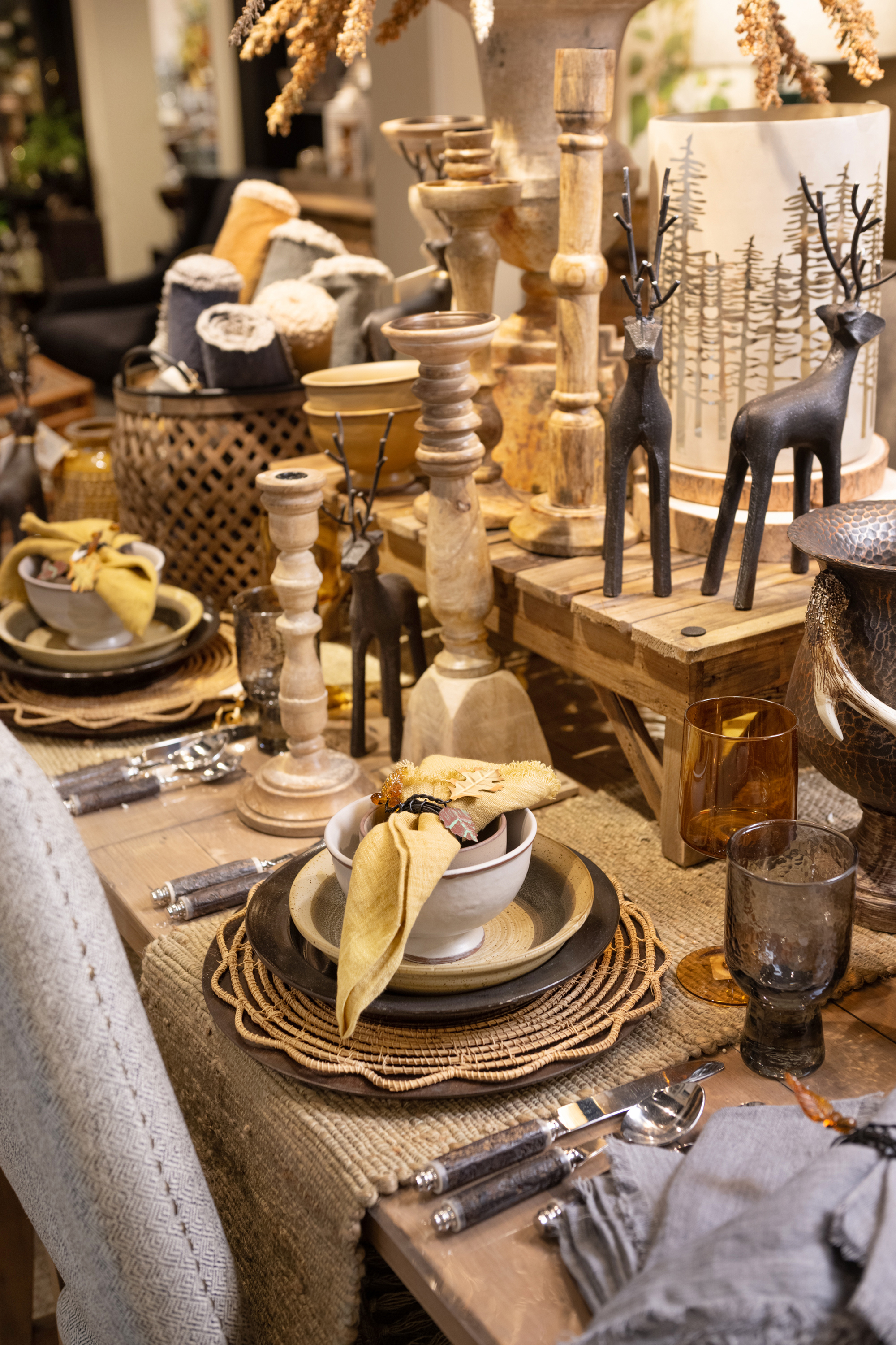 Natural elements are at play in the place setting and throughout the table, lending to a homey warm feel to this tabletop.