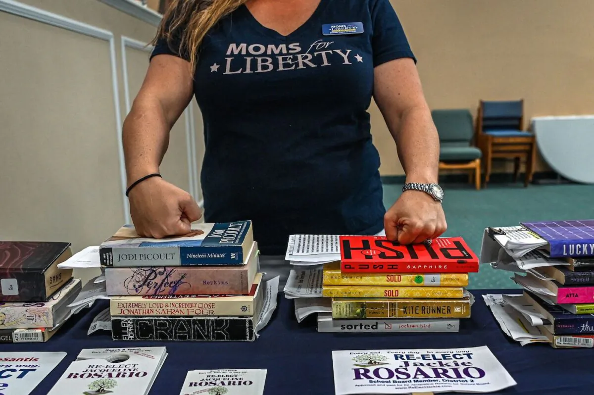 Jennifer Pippin, president of the Indian River County chapter of Moms for freedom, attends Jacqueline Rosario's campaign event in Vero Beach, Fla. on Oct. 16, 2022. Rosario's candidacy for re-election to a school board was supported by "Moms for Liberty.” (Giorgio Viera/AFP via Getty Images)