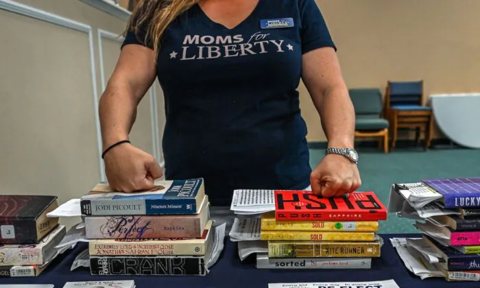 Jennifer Pippin, president of the Indian River County chapter of Moms for freedom, attends Jacqueline Rosario's campaign event in Vero Beach, Fla. on Oct. 16, 2022. Rosario's candidacy for re-election to a school board was supported by "Moms for Liberty.” (Giorgio Viera/AFP via Getty Images)
