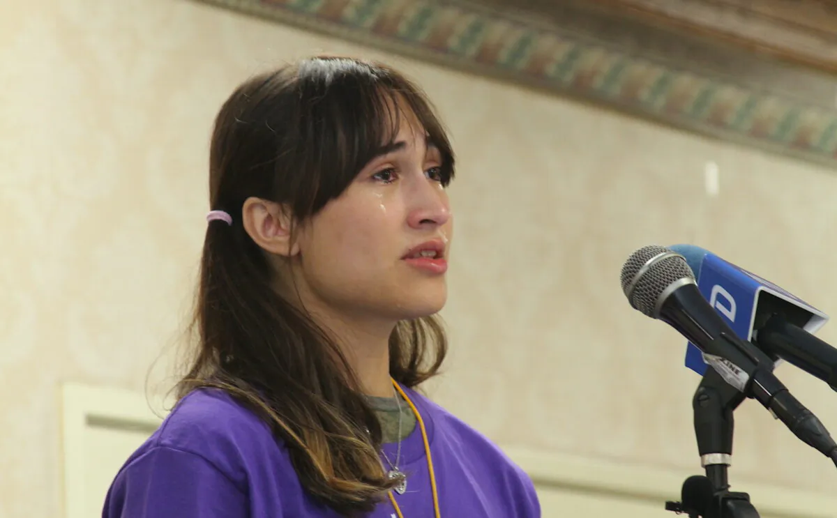 Chloe Cole tearfully shares her detransition journey in Anaheim, Calif., on Oct. 8, 2022. (Brad Jones/The Epoch Times)
