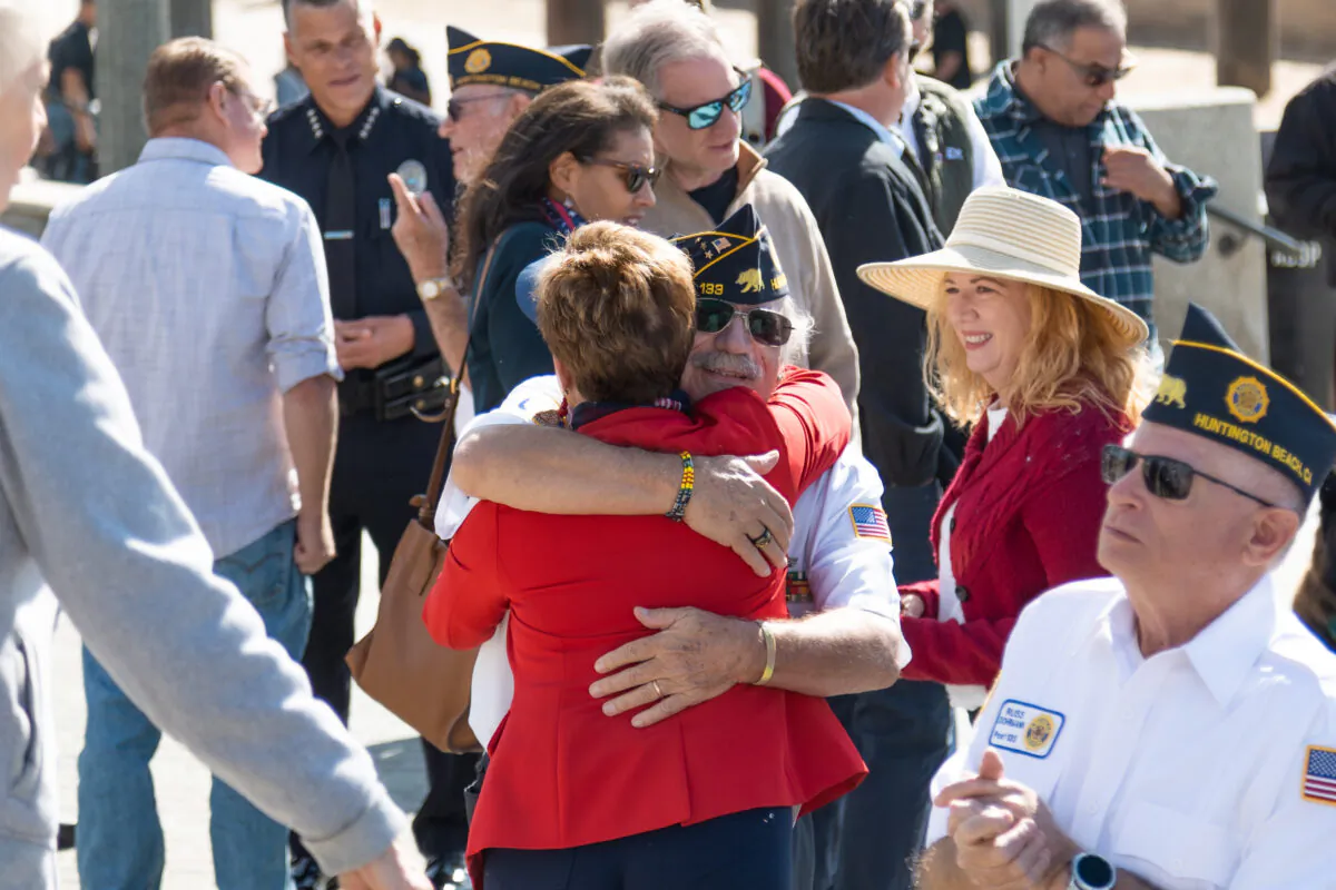 A crowd gathers for the Veterans Day ceremony at Pier Plaza in Huntington Beach, Calif., on Nov. 11, 2022. (Julianne Foster/The Epoch Times)