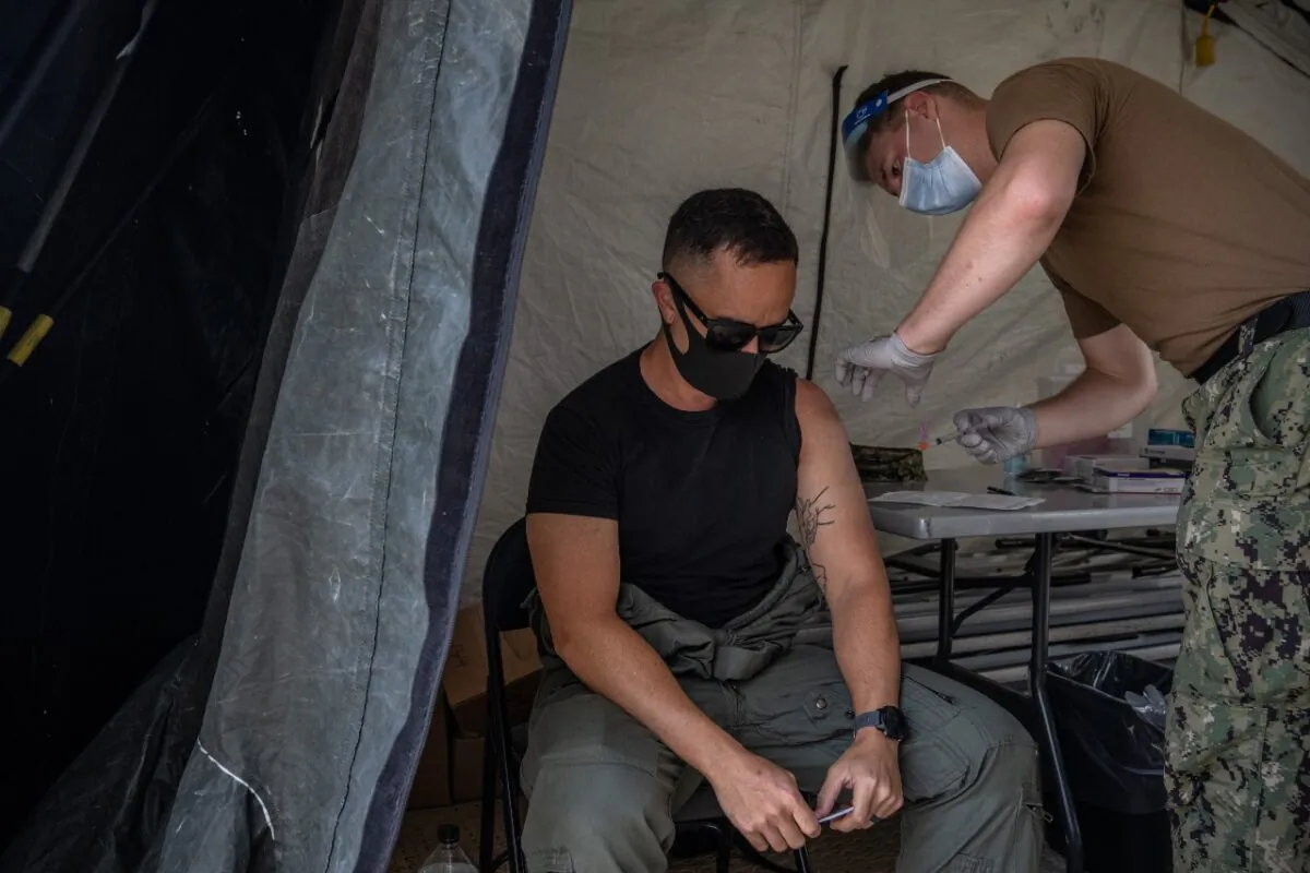 A member of the U.S. military receives the Moderna coronavirus vaccine at Camp Foster on April 28, 2021 in Ginowan, Japan. (Carl Court/Getty Images)