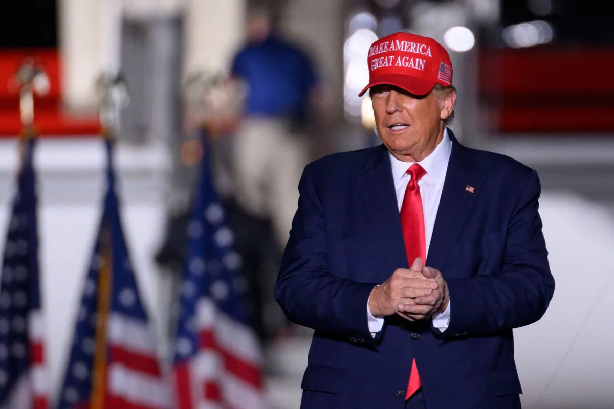 Former President Donald Trump arrives for a "Save America" rally ahead of the midterm elections at Arnold Palmer Regional Airport in Latrobe, Pa., on Nov. 5, 2022. (Angela Weiss/AFP via Getty Images)