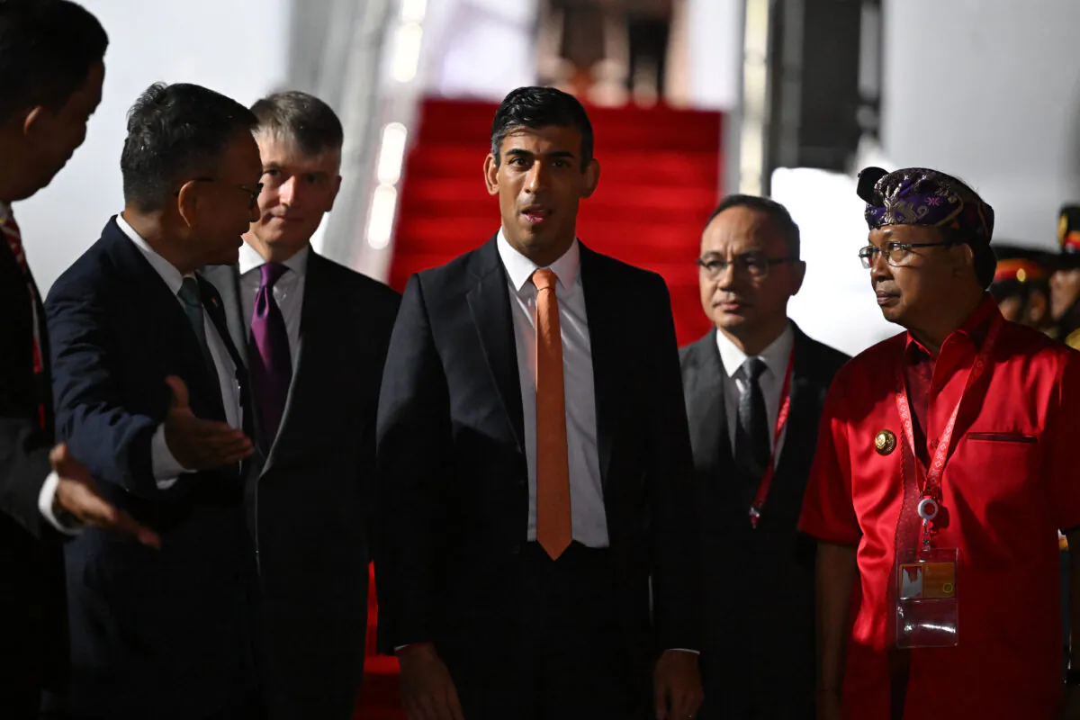 British Prime Minister Rishi Sunak is welcomed at the Bali Ngurah Rai International Airport upon his arrival for the G-20 meeting, in Bali, Indonesia, on Nov. 14, 2022. (Leon Neal - Pool/Getty Images)