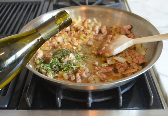 Making Rolled Stuffed Turkey Breast with Sausage & Herb Stuffing