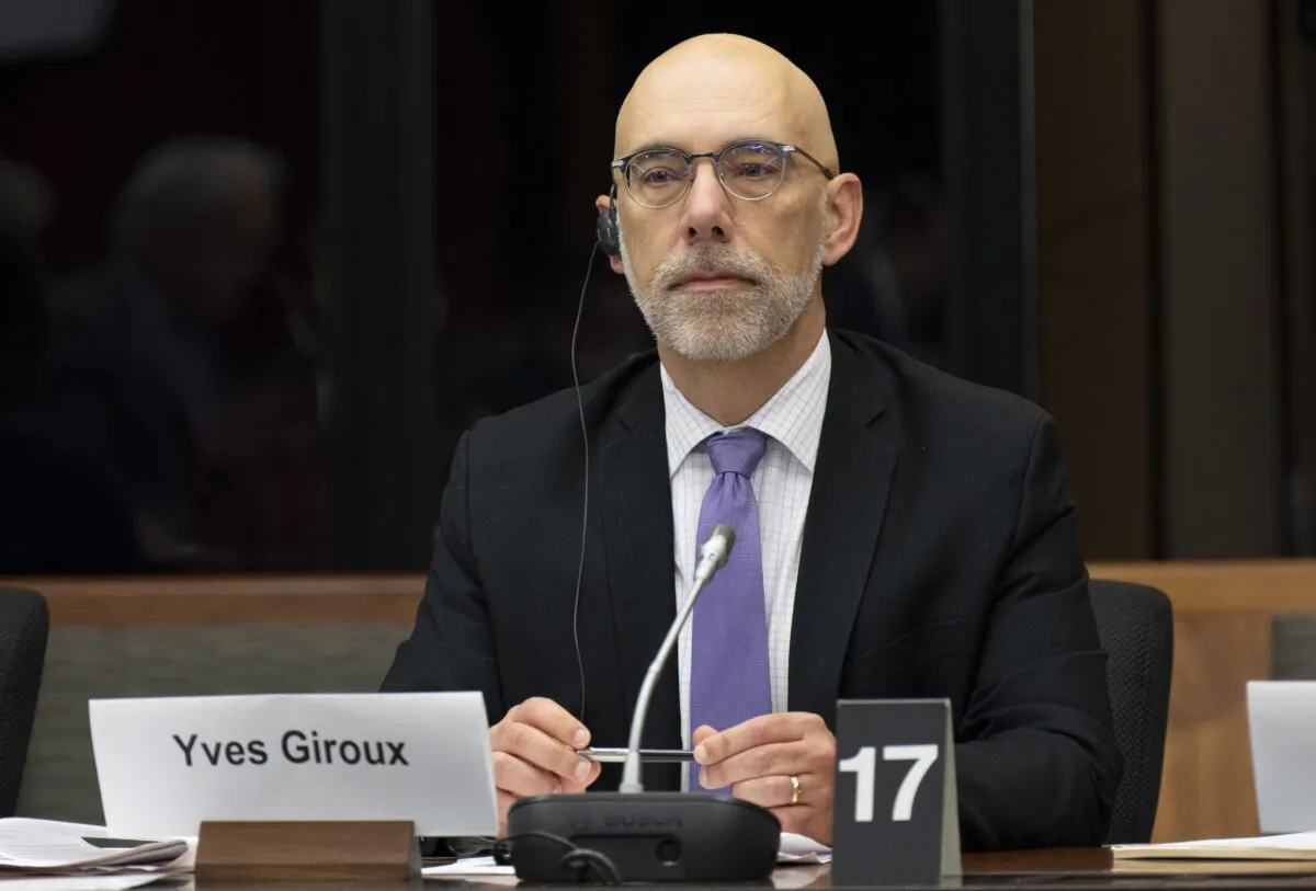 Parliamentary Budget Officer Yves Giroux waits to appear before appearing at the Senate Committee on National Finance in Ottawa on Oct. 25, 2022. (The Canadian Press/Adrian Wyld)