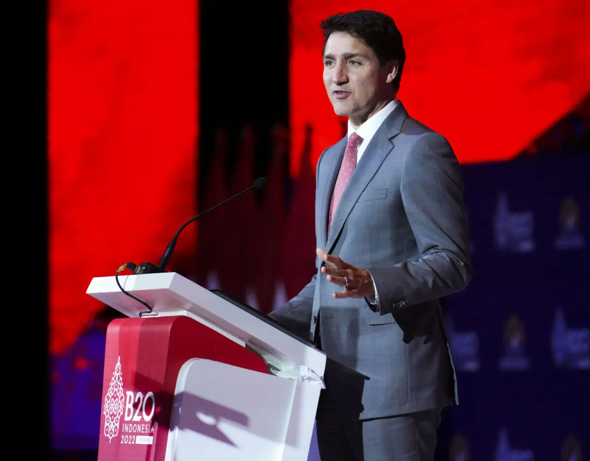 Prime Minister Justin Trudeau delivers a speech at the B20 Summit ahead of the G20 Summit in Nusa Dua, Bali, Indonesia, on Nov. 14, 2022. (The Canadian Press/Sean Kilpatrick)
